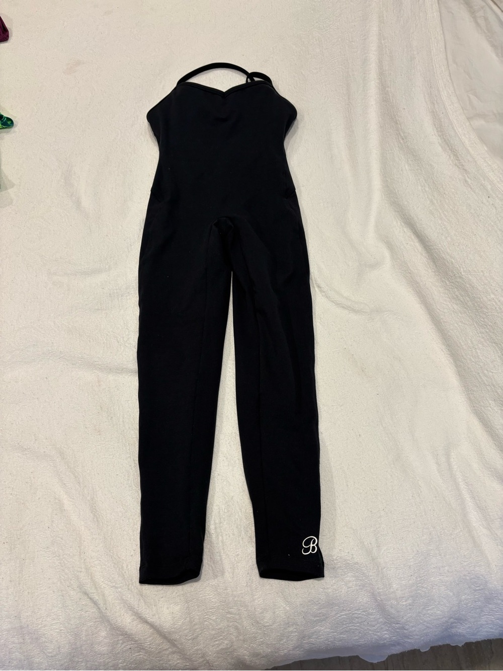 Bombshell Sportswear Black Strappy Fitted Jumpsuit